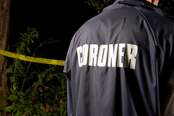 Coroner at crime scene